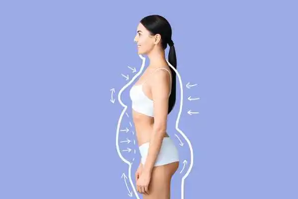 image of woman experiencing fat reduction treatment Greater London (Enfield)