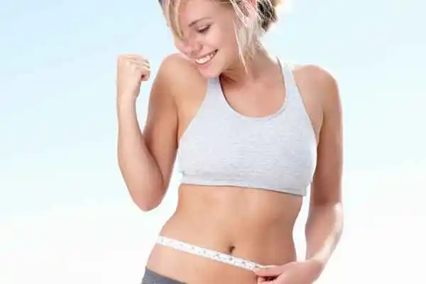 woman happy after fat reduction treatment Greater London (Enfield)
