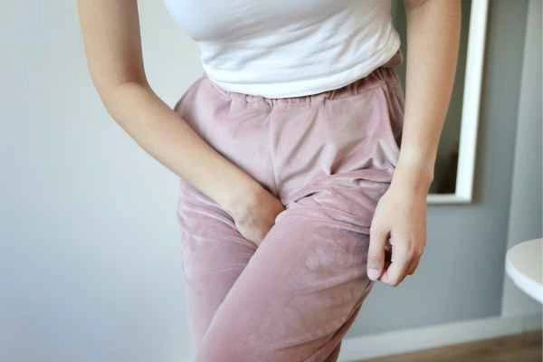older woman running to the toilet because of urinary incontinence Greater London (Enfield)